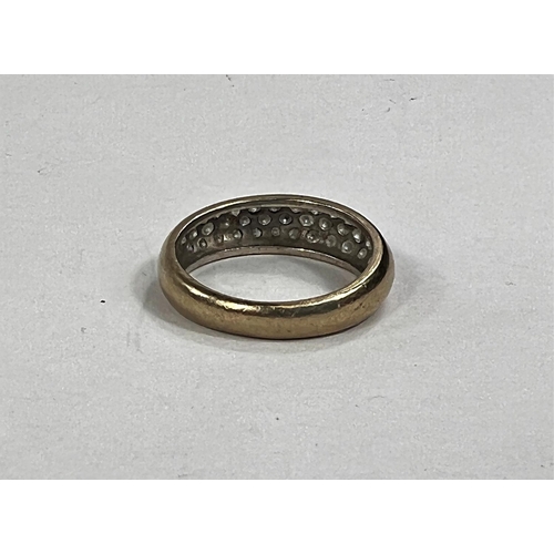 614 - An 18 carat gold half eternity ring with 3 rows of diamonds, approximately 43 diamonds in total, 4.2... 