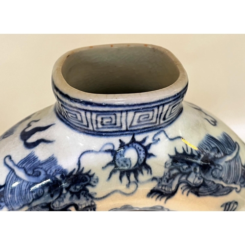 475A - A Chinese blue and white teapot with central hole and 4 character mark to base. HeightA Stone ware b... 