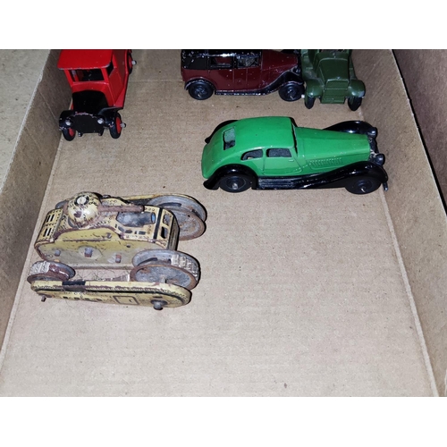 234 - A Japanese miniature tinplate model of a tank; 5 various Dinky cars inc. Mercedes Benz racing car