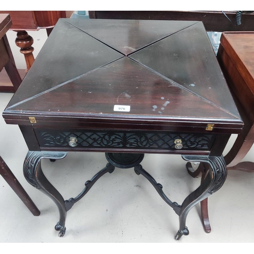 976 - A mahogany card table with quarter fold-out flaps, green baize, single drawer, cabriole legs.