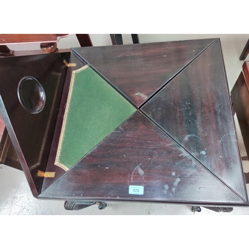 976 - A mahogany card table with quarter fold-out flaps, green baize, single drawer, cabriole legs.