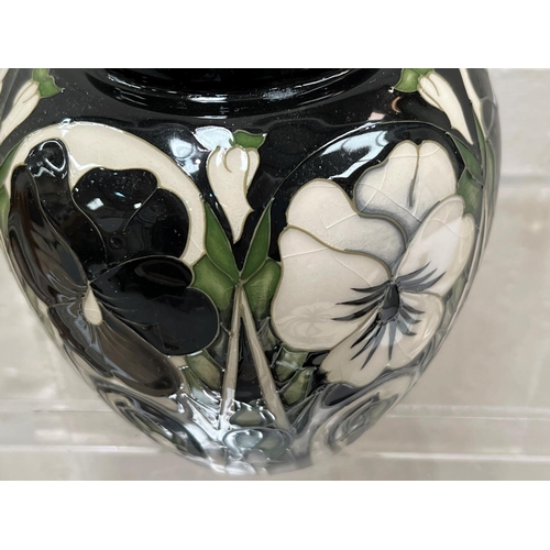 431 - A modern Moorcroft covered ginger jar 'Harliquinade' pattern, decorated with black and white pansies... 