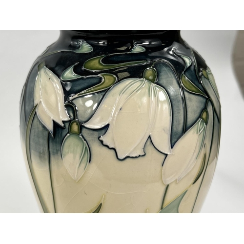 437 - A modern Moorcroft inverted baluster vase 'Nivalis' pattern, decorated with snowdrops against an ivo... 