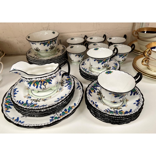 558 - A 1930's Royal Doulton part tea service, 34 pieces approx; a Royal Doulton 12 piece part tea service... 