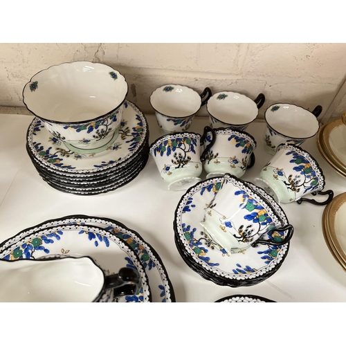 558 - A 1930's Royal Doulton part tea service, 34 pieces approx; a Royal Doulton 12 piece part tea service... 