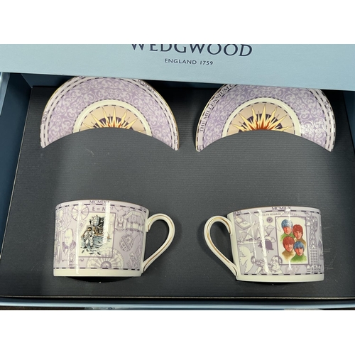 593 - Four boxed Wedgewood sets of cups + saucers, Millennium collection (18th,19th,20th,21st century)