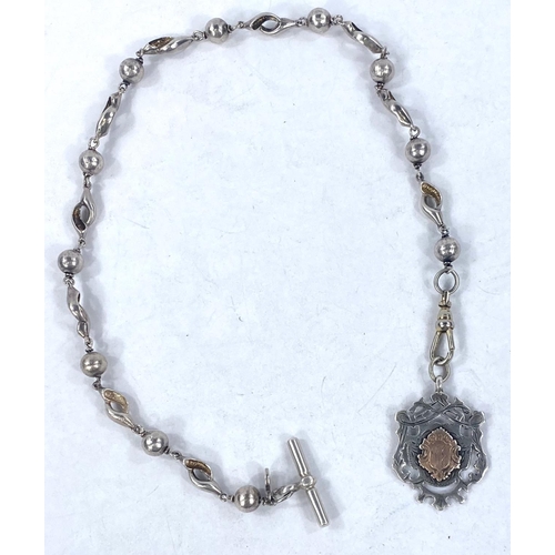 603 - An unusual white metal Albert chain of shell form, stamped 925 to clasp and hallmarked silver medall... 