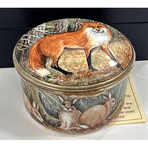 439b - A Moorcroft enamel hand painted pill box decorated with fox, hedgehog and other animals, trial piece... 