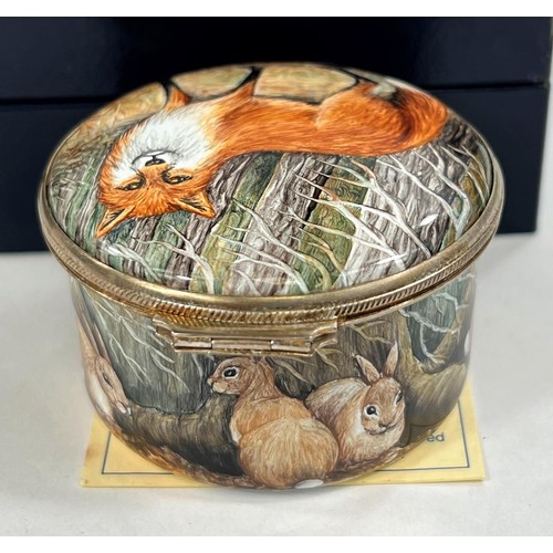 439b - A Moorcroft enamel hand painted pill box decorated with fox, hedgehog and other animals, trial piece... 