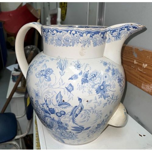 536B - A very large Victorian water jug decorated in blue and white with Asiatic pheasant pattern, height 3... 