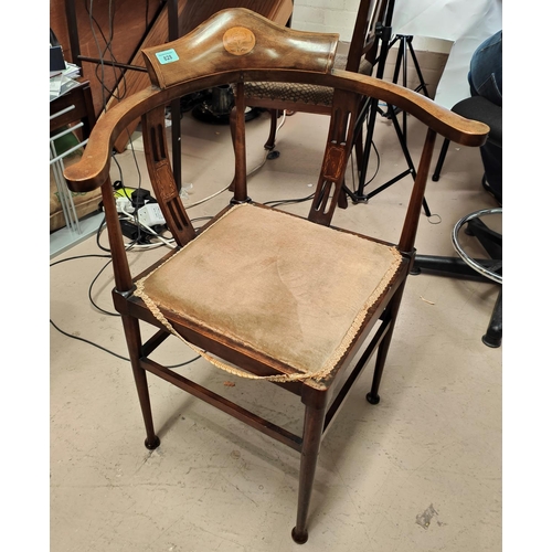 828 - An Edwardian inlaid mahogany corner armchair in the Sheraton style