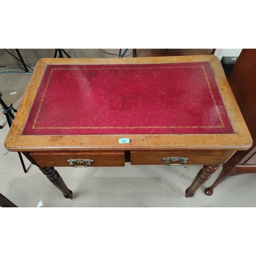 986 - A mahogany side/writing table with inset red leather top, with two frieze drawers & turned legs,... 