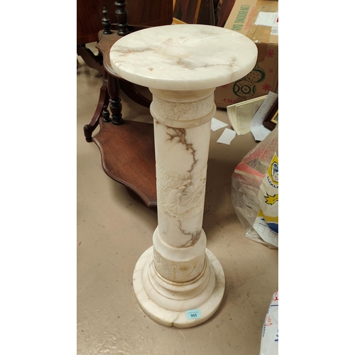995 - A marble columns plant stand decorated with carved flowers, height 72cm