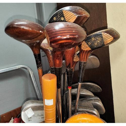 46 - A selection of vintage early 20th century golf clubs:  hickory shat examples; Dai Rees GX woods; bag... 