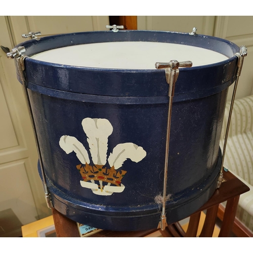 12D - A marching drum in blue with Prince of Wales's feathers painted on the front