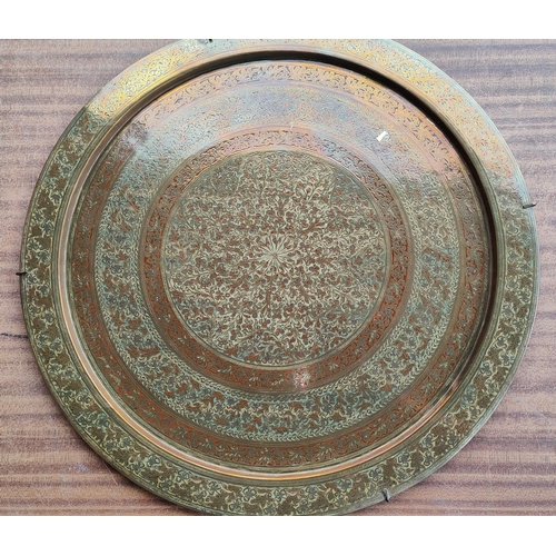 12K - An Indian style brass wall hanging dish and a selection of brassware; a vintage tape deck