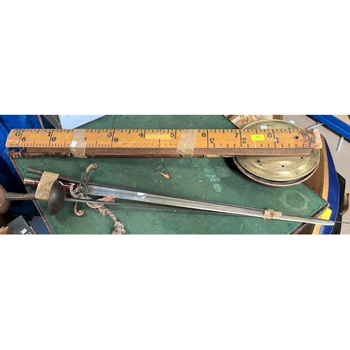 26 - A 19th century warming pan; 2 large rulers; 2 fencing foils; a reproduction sword