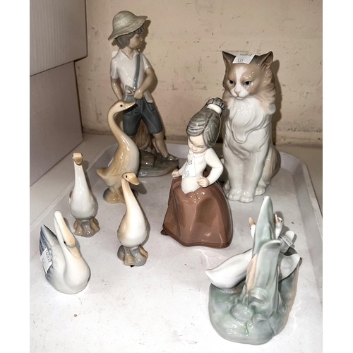 554 - Two Nao figures, boy and girl, Nao cat and Nao geese group, other geese (not Nao); 6 Royal Doulton a... 