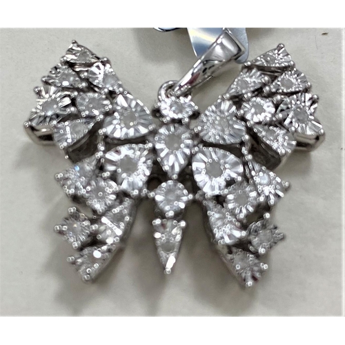 719 - A Sterling silver Butterfly pendant set with 30 Halo diamonds, total of 0.25 carats, gross weight 5.... 