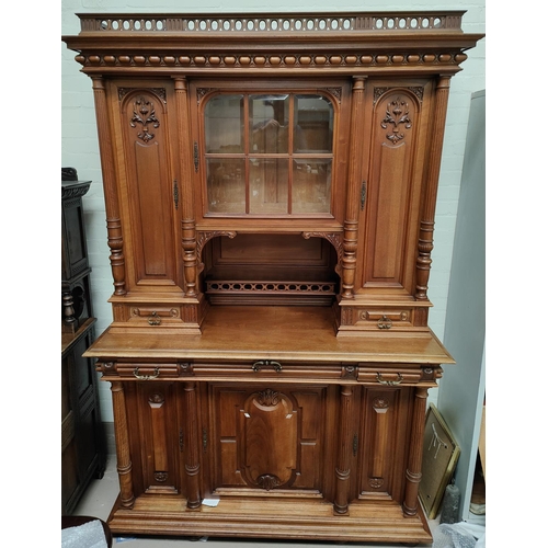 966 - A late 19th century walnut French provincial full height side cabinet with turned gallery, central g... 