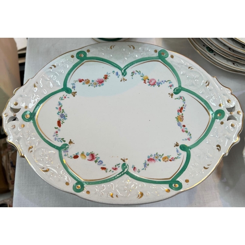 568 - A Victorian opaque dessert service with comports etc decorated with polychrome swags, comprising 3 s... 