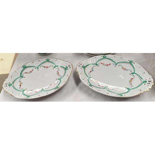 568 - A Victorian opaque dessert service with comports etc decorated with polychrome swags, comprising 3 s... 