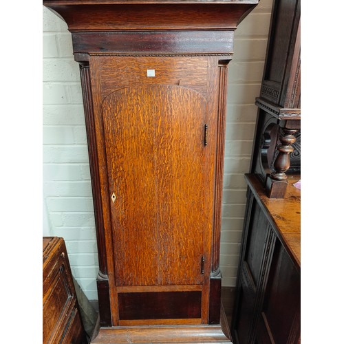 918 - An early 19th century oak and mahogany longcase clock, with swan neck pediment and reeded side colum... 