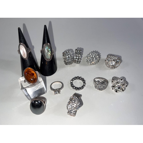 620 - A selection of 14 fancy dress rings, 2 of which are hallmarked silver, others diamante etc