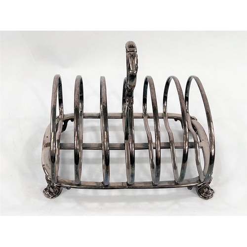 721 - A hallmarked silver 6 division toast rack with kidney shaped dividers with central ring handle, on 4... 