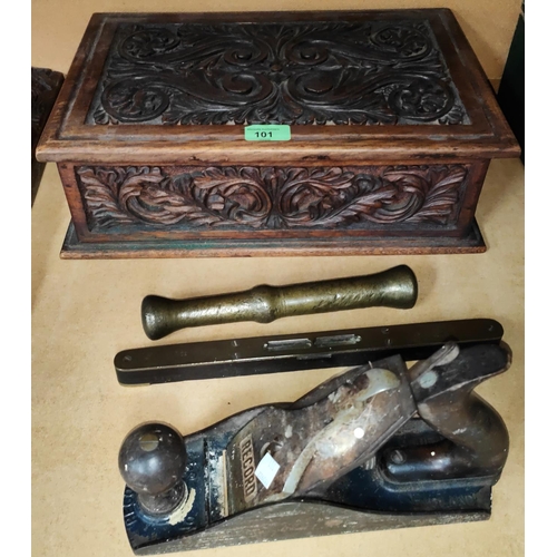 101 - A Victorian carved oak rectangular box, length 40cm; a brass spirit level; a brass pestle; a Record ... 