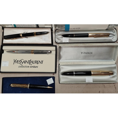 121 - Two Parker fountain pens in original boxes; a Montblanc similar; an Yves Saint Laurent ballpoint pen... 