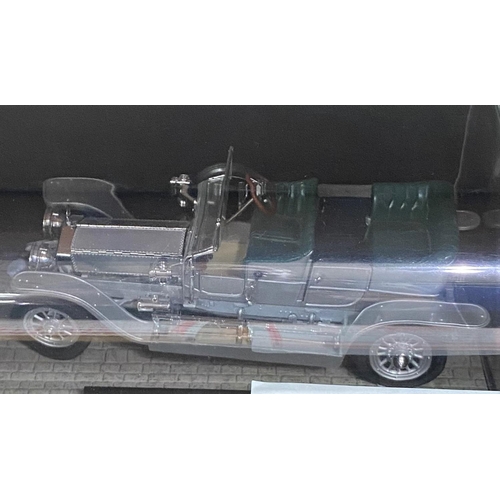 25 - A Franklin Mint 1907 Rolls-Royce Silver Ghost in display box; a Schuco Lotus Formula 1 car; other bo... 