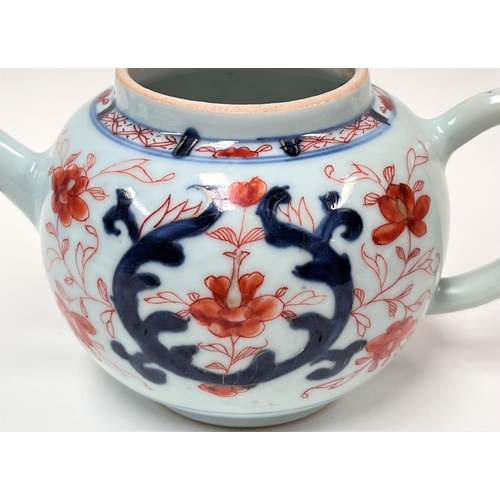 460 - An 18th century Chinese Imari pattern teapot with floral decoration, length 19cm (restoration to lid... 