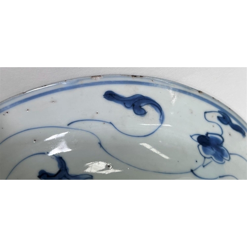 467 - A Chinese Kangxi period dish in blue & white with traditional decoration, mark to base, 21cm