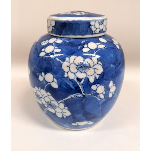 468 - An 18th century Chinese blue & white ginger jar decorated with prunus blossom, 6 character mark ... 