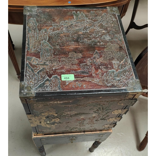 494 - A late 19th/early 20th century Chinese/Japanese square lacquered cabinet, the top and sides with ext... 