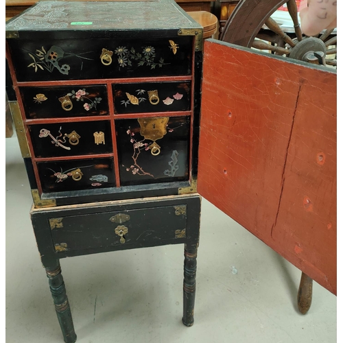 494 - A late 19th/early 20th century Chinese/Japanese square lacquered cabinet, the top and sides with ext... 