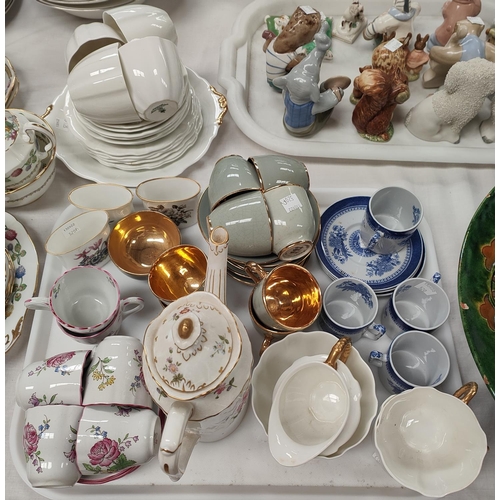 520A - A white and gilt Royal Crown Derby part tea service, a Spode New Stone 4 piece , other similar tea w... 