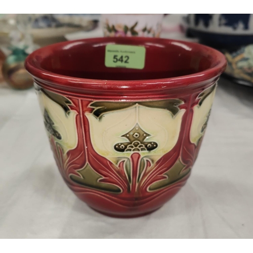 542 - A Minton 'Secessionist' plant pot holder decorated with stylised flowers against a red ground, heigh... 