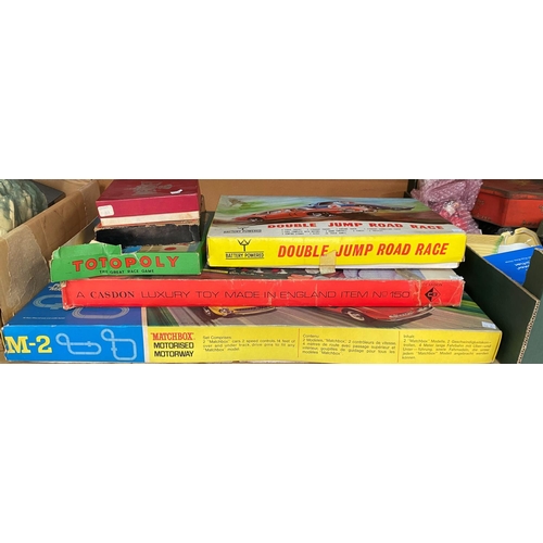 54A - A boxed Matchbox M-2 set, Double Jump Road Race set etc