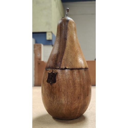 55A - A carved fruitwood tea caddy in the form of a pear