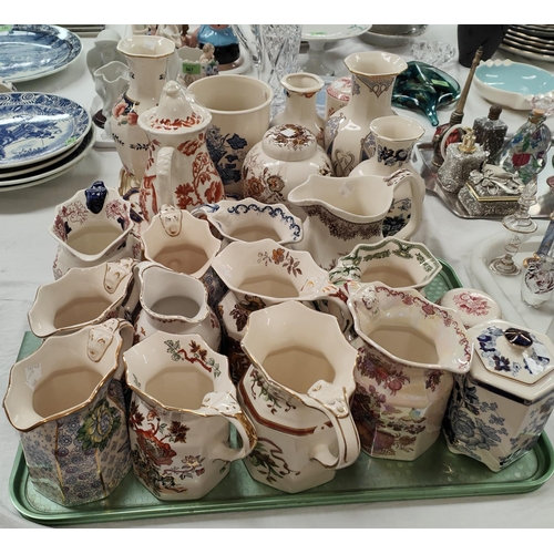 566 - A large selection of Masons jugs, Masons vases, ginger jar, teapot etc