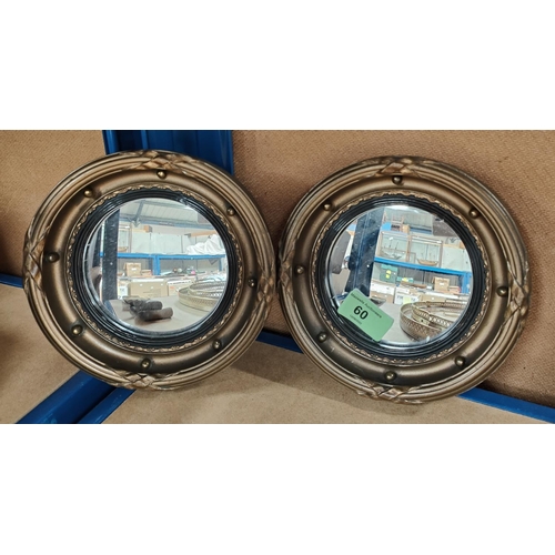 60 - Two miniature convex gilt framed mirrors, dia 17cm and a pine mirror