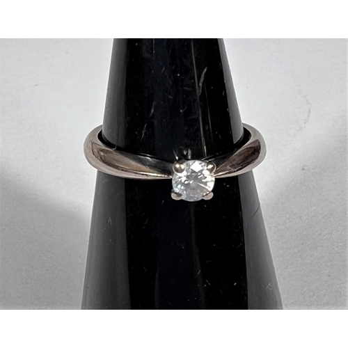 607 - An 18 carat hallmarked gold diamond solitaire ring, 3.7 gm, diamond 4 mm approx