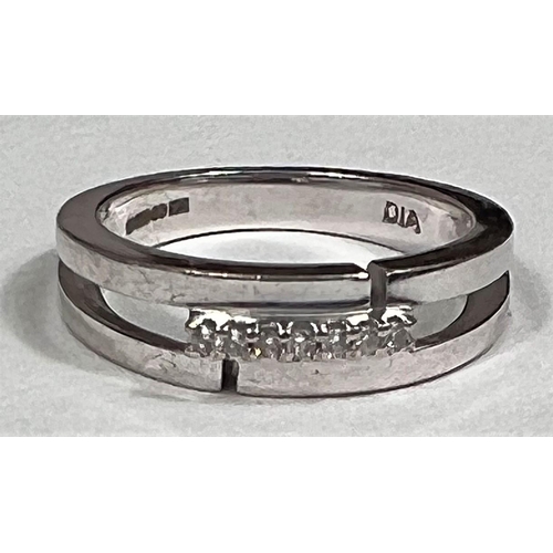 610 - A white gold half eternity ring set 7 diamonds, 2.7 gm