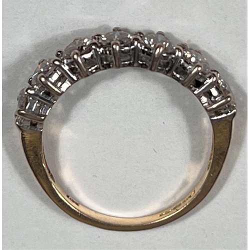 612a - An 18 carat hallmarked gold half eternity ring set 7 diamonds, 3.5mm diameter of stones approx