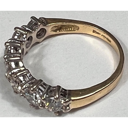 612a - An 18 carat hallmarked gold half eternity ring set 7 diamonds, 3.5mm diameter of stones approx