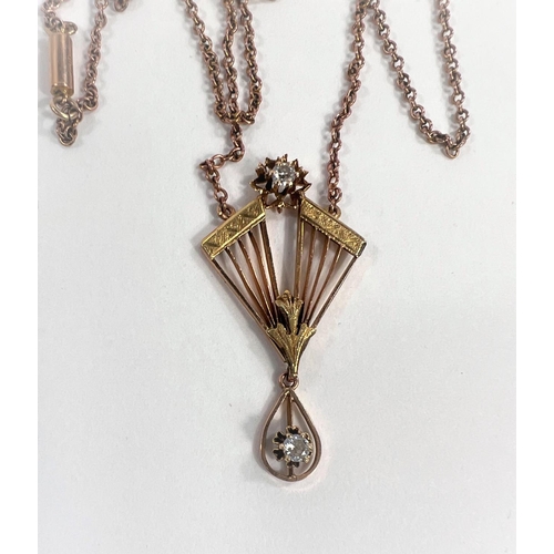 628 - An Art Deco fan shaped yellow metal pendant set with diamond to top loop and the drop below, with ye... 