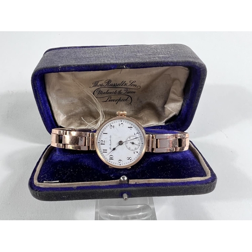 635 - An early 20th century lady’s wristwatch by Thomas Russell & Sone,  in 9 carat hallmarked rose go... 