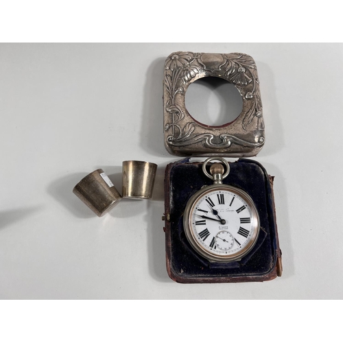 654 - A large keyless open faced pocket watch in Art Nouveau embossed hallmarked silver overnight case, Bi... 